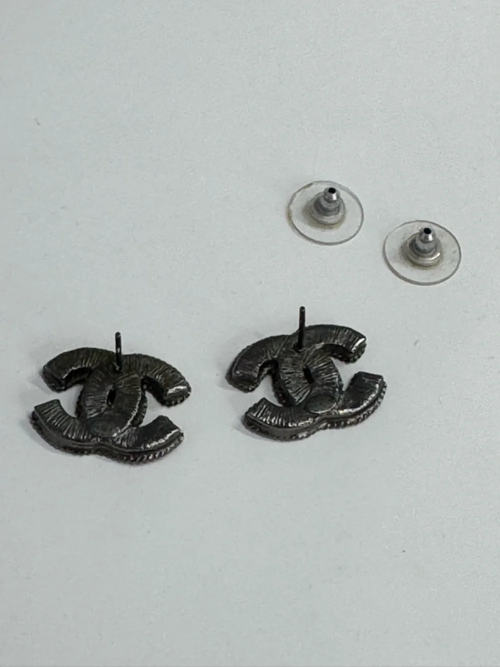 Authentic CHANEL Black Enamel CC Stud Earrings with Silver-Toned Trim - Picture 3 of 3